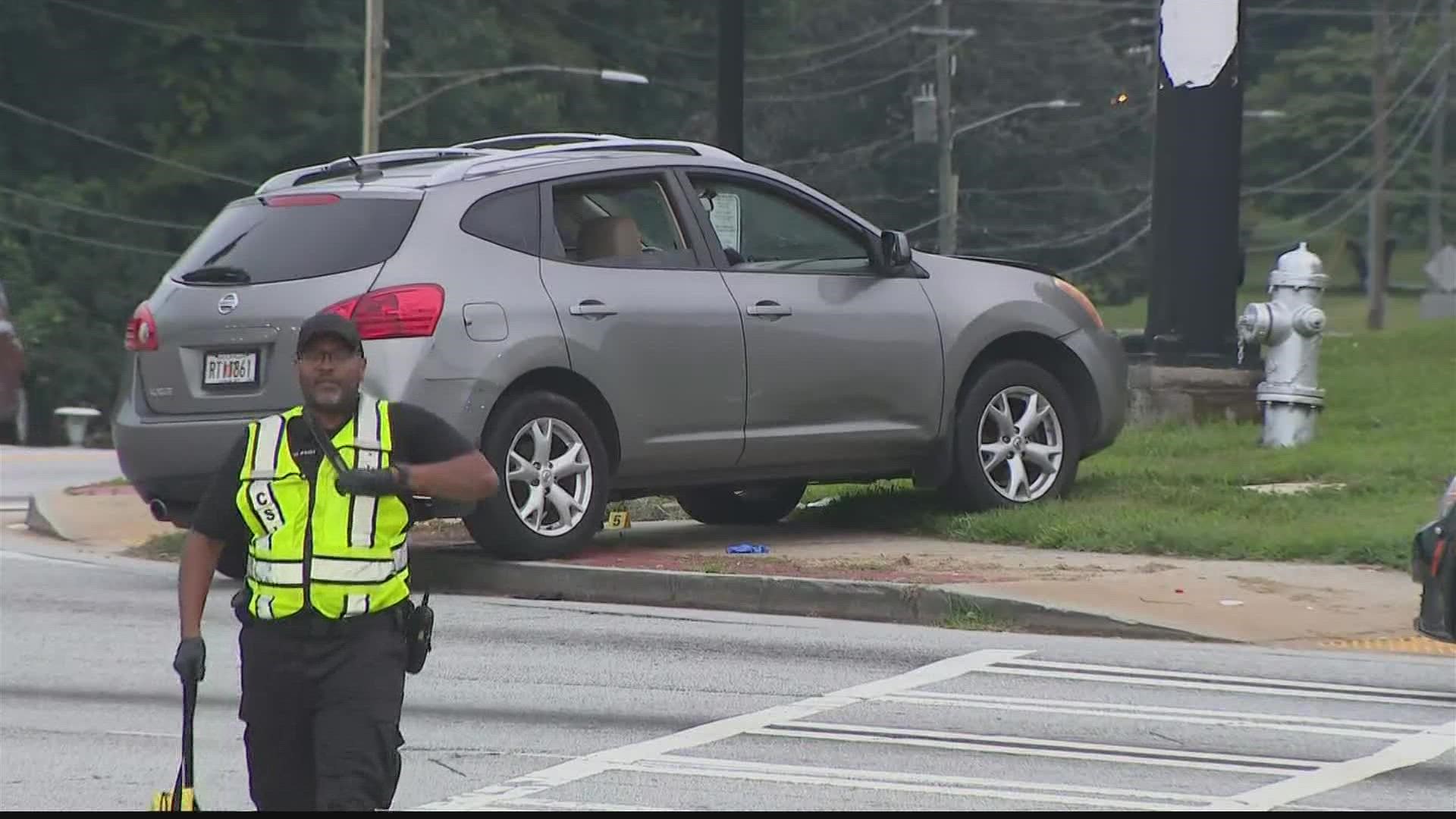 DeKalb County Police are investigating after a driver who was shot several times crashed into a telephone pole in Redan, they said.