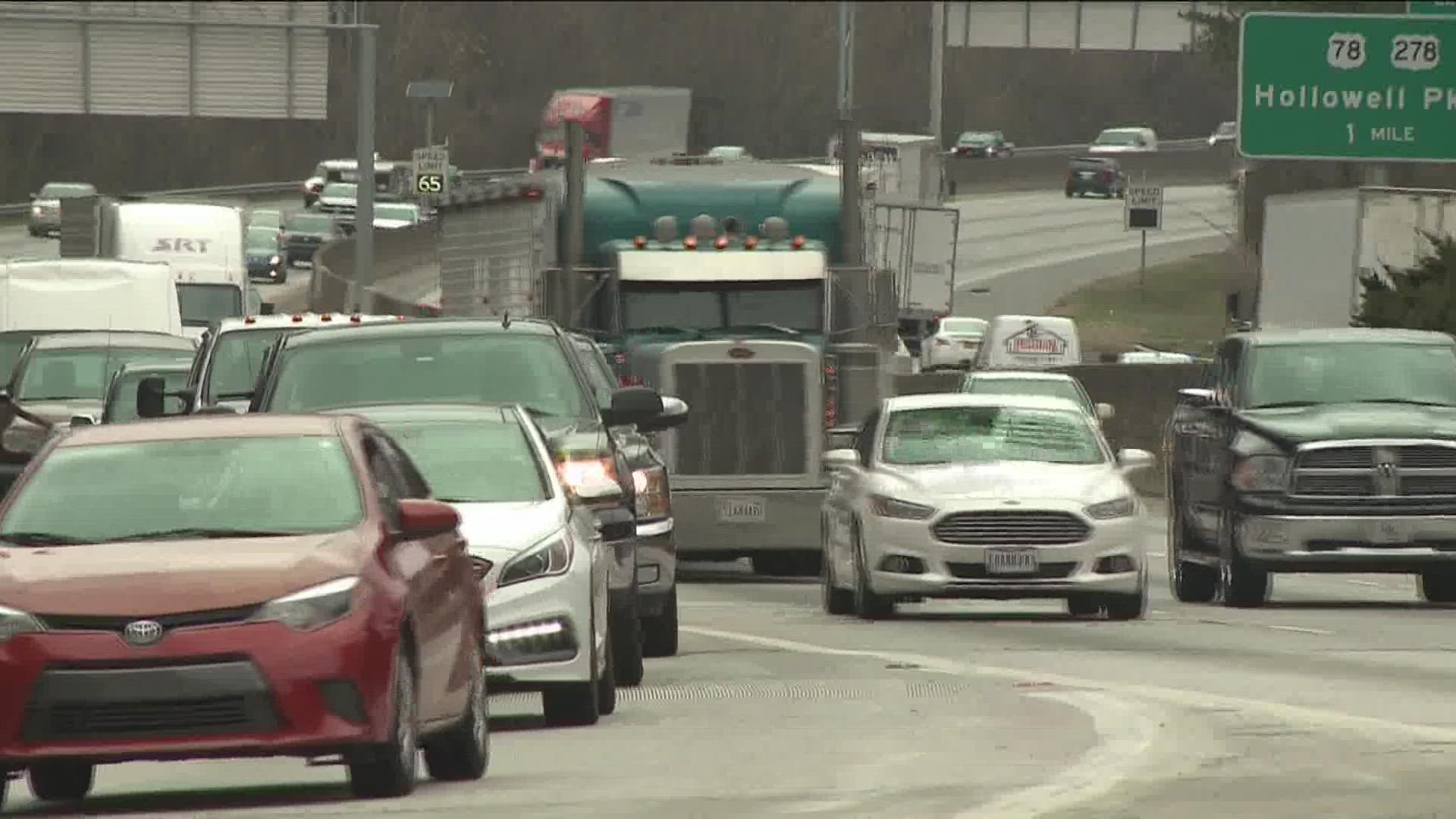 Former Atlanta mayor Andrew Young says a fight over the state flag two decades ago cost Georgia a major highway project – and commuters today are paying for it.