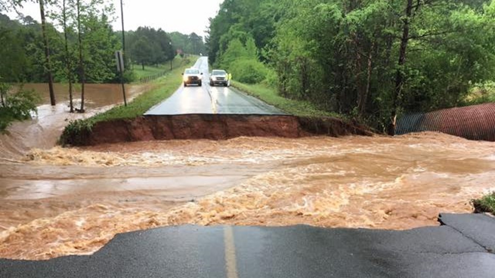 Severe flooding washes away Conyers driveway, shuts down roadways