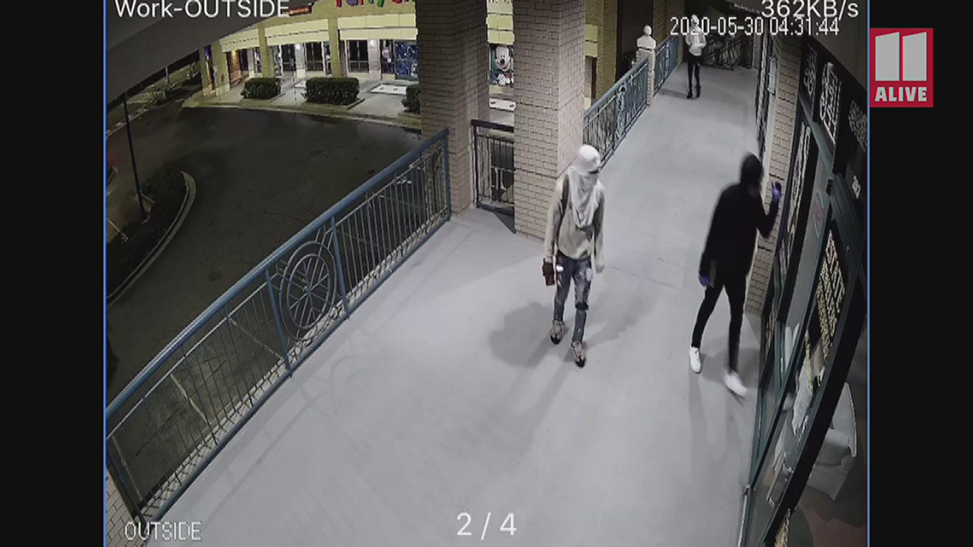 About a dozen suspects were seen on surveillance video breaking into a Buckhead jewelry store and taking off with thousands of dollars worth of merchandise.