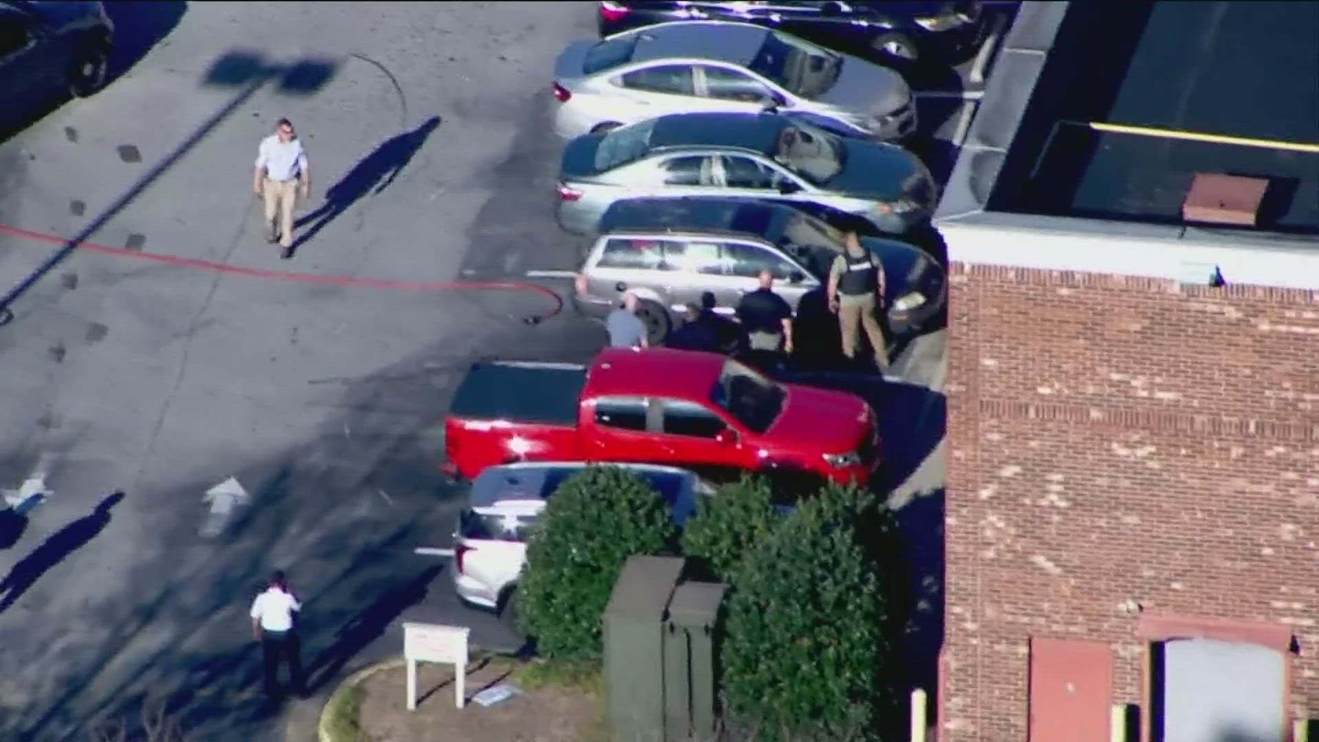 Woman dies after being shot in head in Loganville CVS parking lot ...
