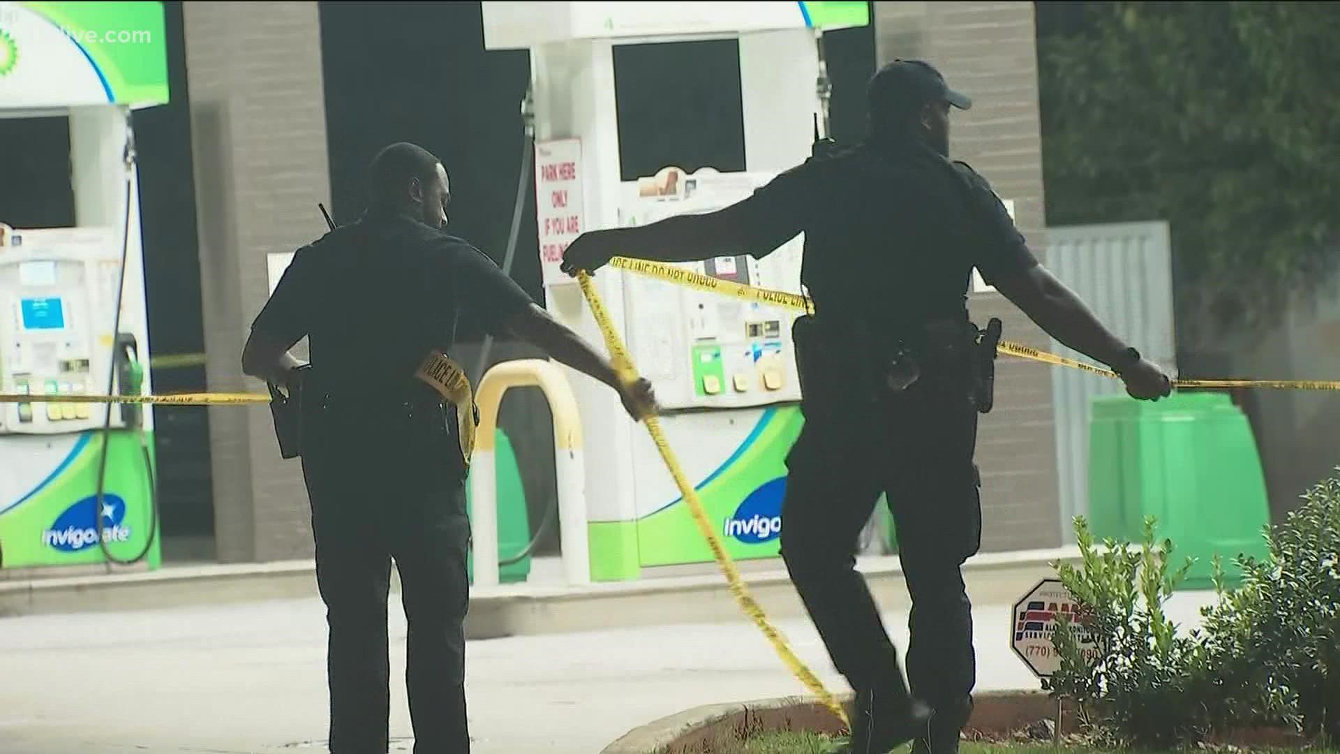 The man was shot in the shoulder at a BP gas station.