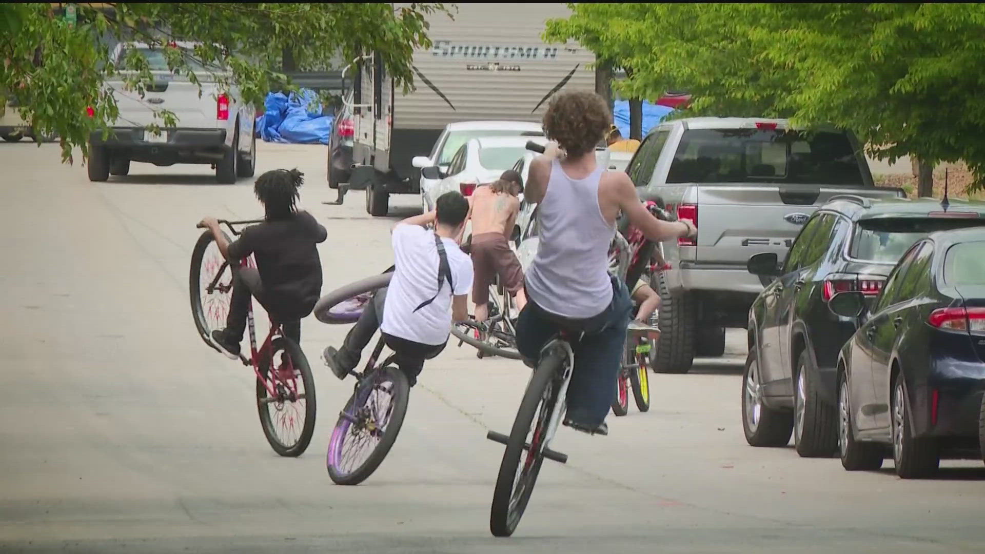 A group of about 80 to 100 people rode their bikes through the Old 4th Ward Skate Park to Northside Drive Sunday.