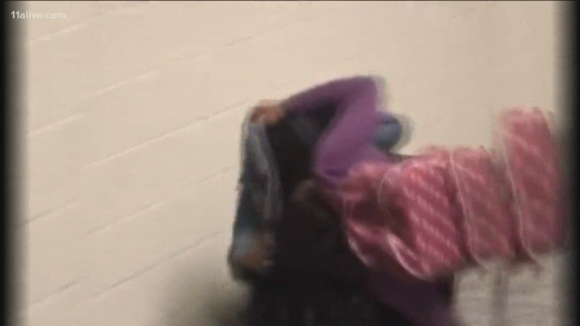 A mother claims a fight happened at a Dekalb County school involving two adults and her twin daughters.