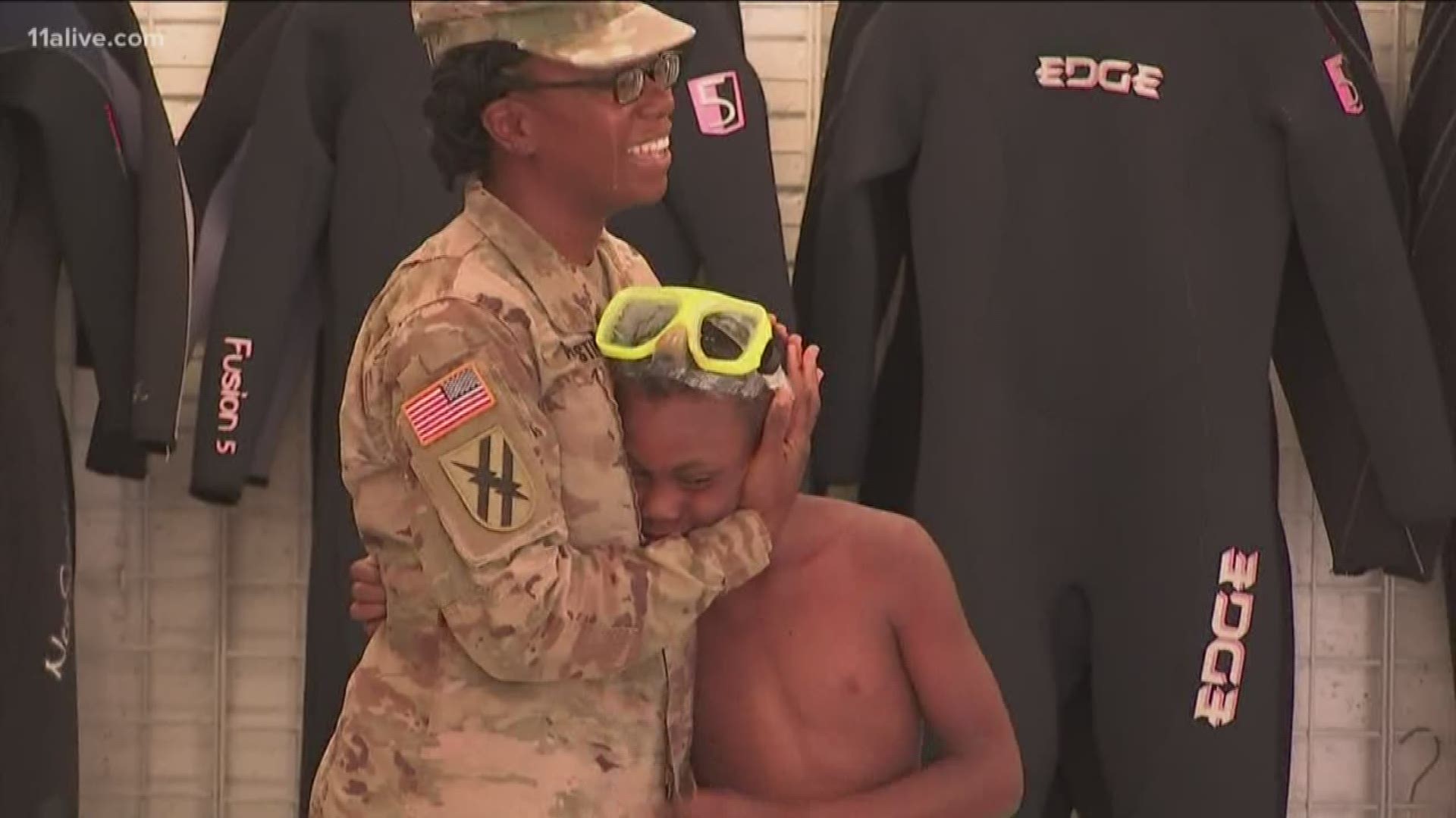He hadn't seen his mom in 9 months after she was deployed to Afghanistan. When he surfaced during scuba diving class, her face was the first he saw.