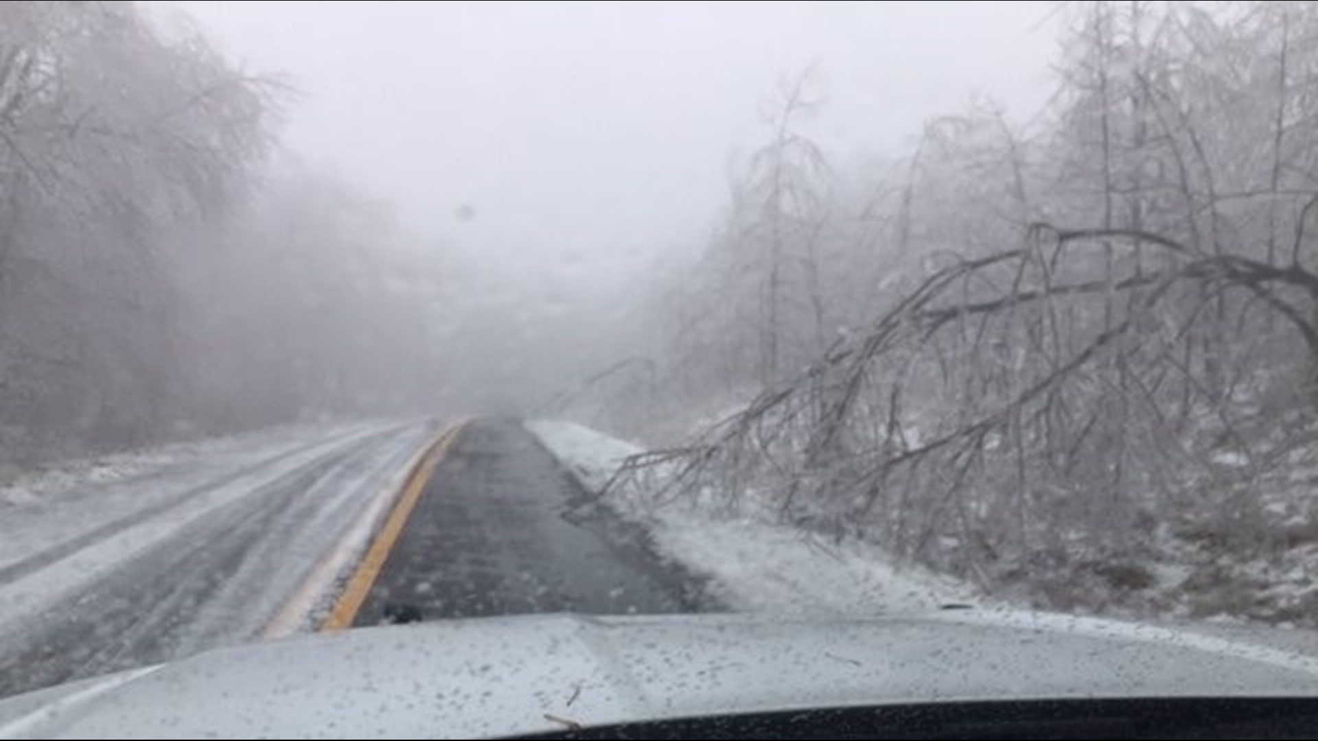 After snow and ice covered much of northeast Georgia, crews worked to clear fallen trees and treat icy roads.