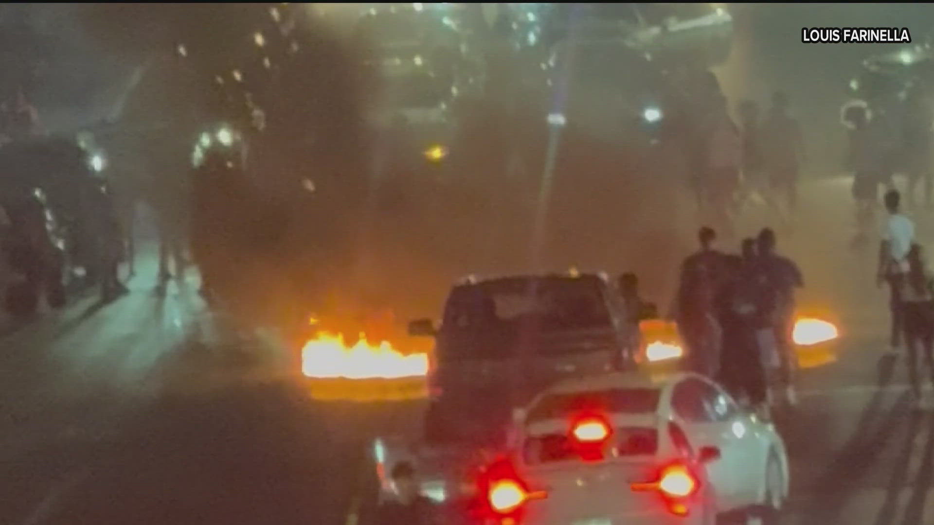 Fire, smoke, and fireworks block traffic during street takeover in ...