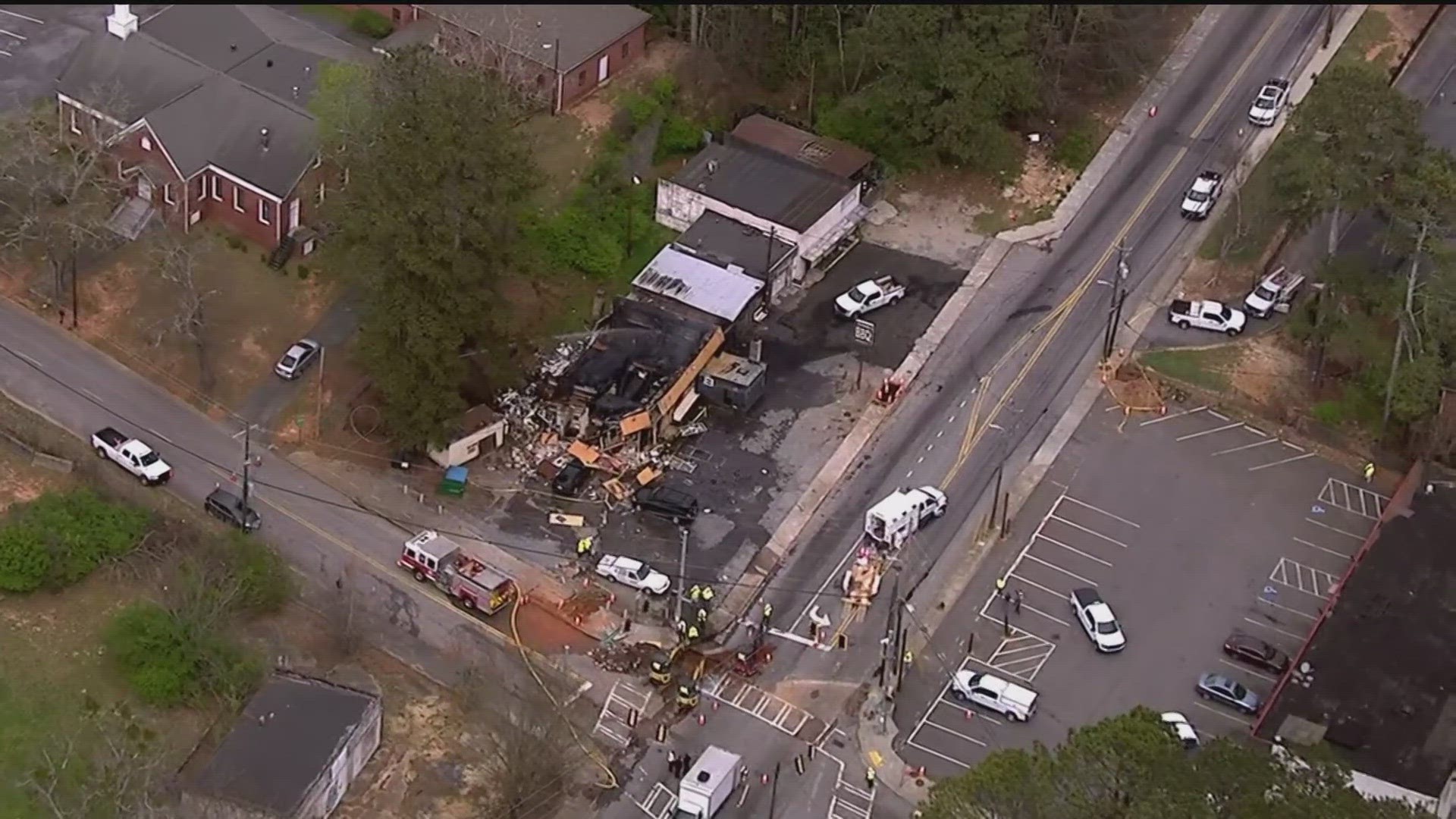 Atlanta Fire Rescue said an explosion caused the fire at the restaurant.