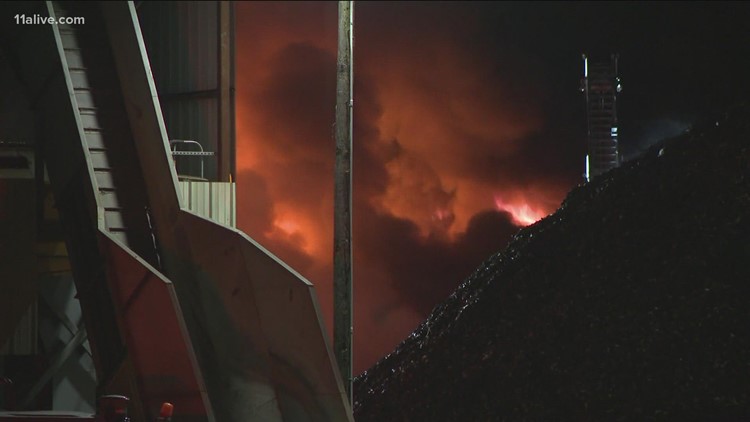 Large fire reported at car recycling plant in DeKalb; Plumes of black smoke fill air