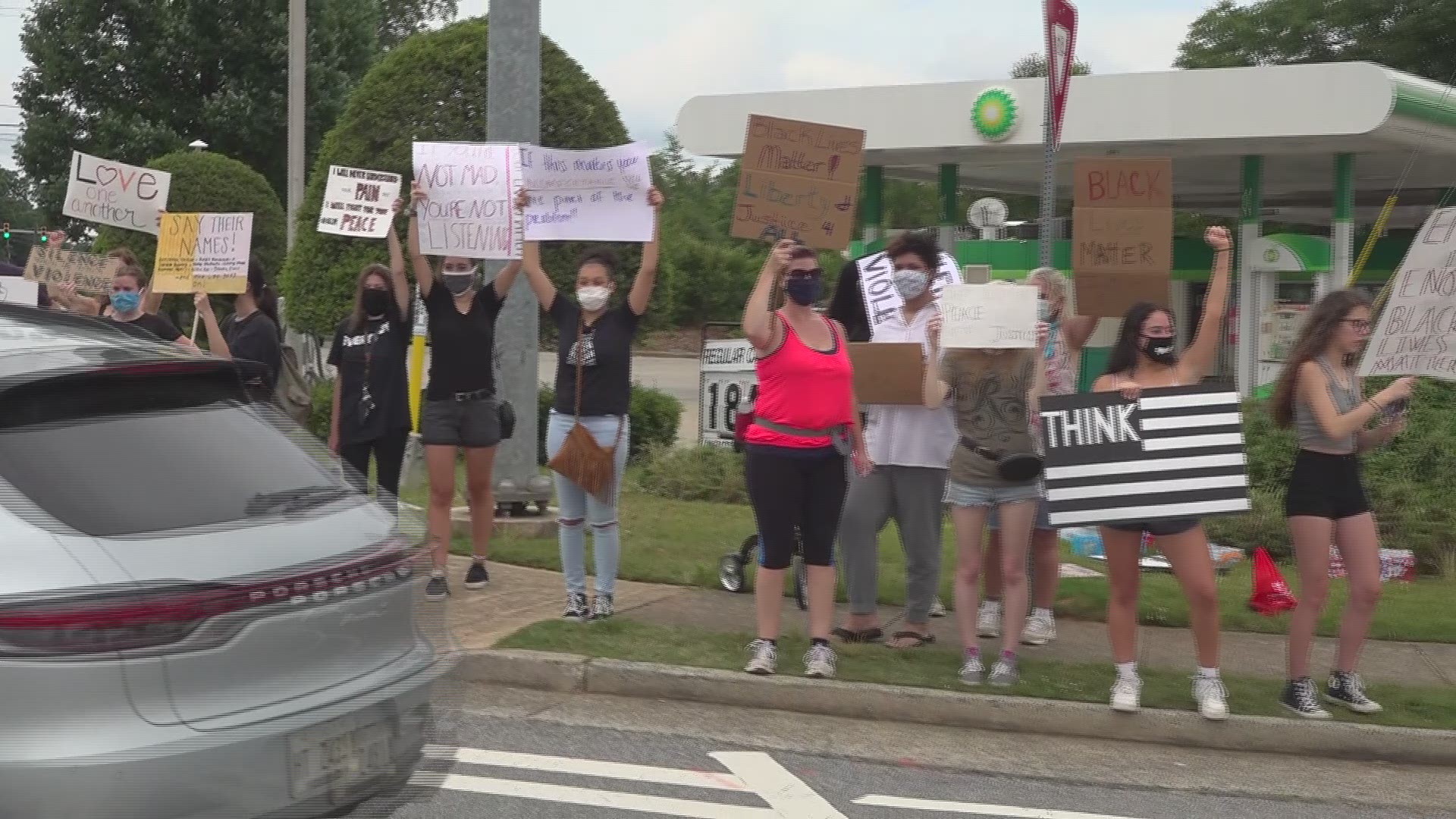 Dozens of teens came together for a peaceful protest Monday afternoon in Marietta.