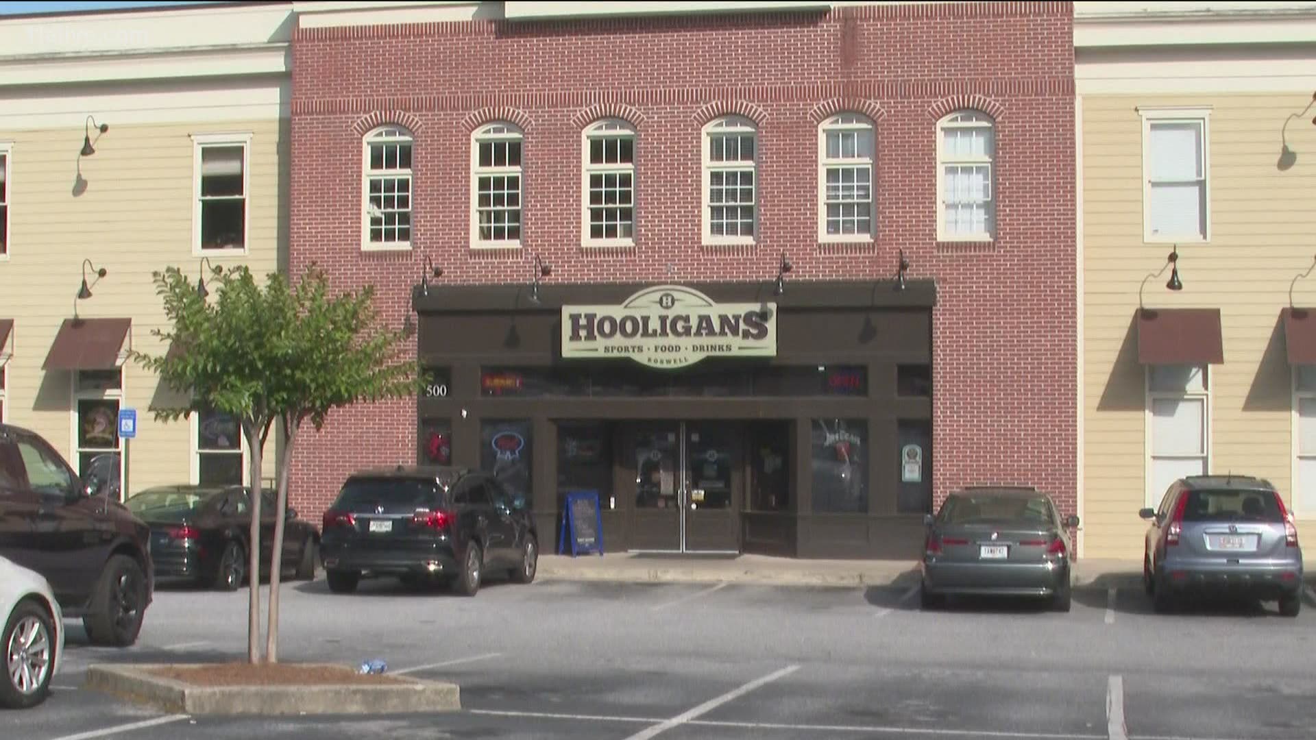 Roswell Police said they responded to a shooting call at Hooligans Tavern, on Holcomb Bridge Rd., and discovered a man with "multiple gunshot wounds."