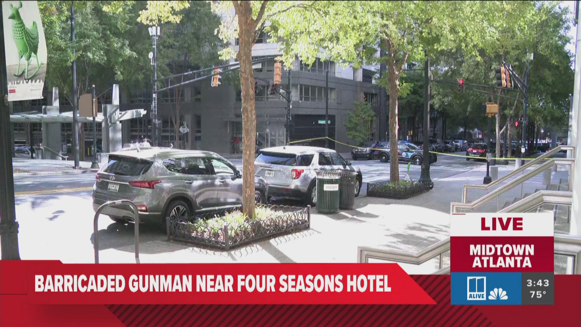 Shots have been fired near the busy Four Seasons Hotel in Midtown Atlanta as police investigate a call for a barricaded gunman on Tuesday afternoon. 