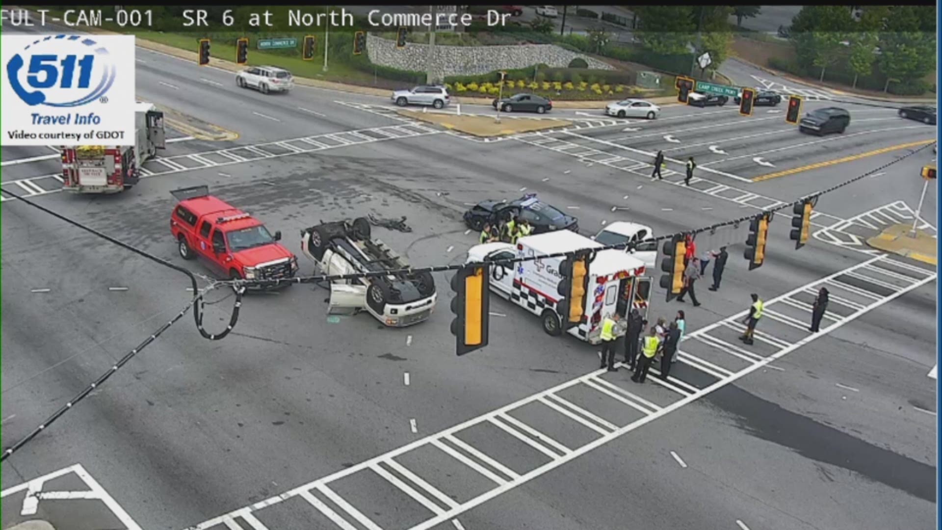 Overturned vehicle blocking intersection on Camp Creek Parkway in South Fulton