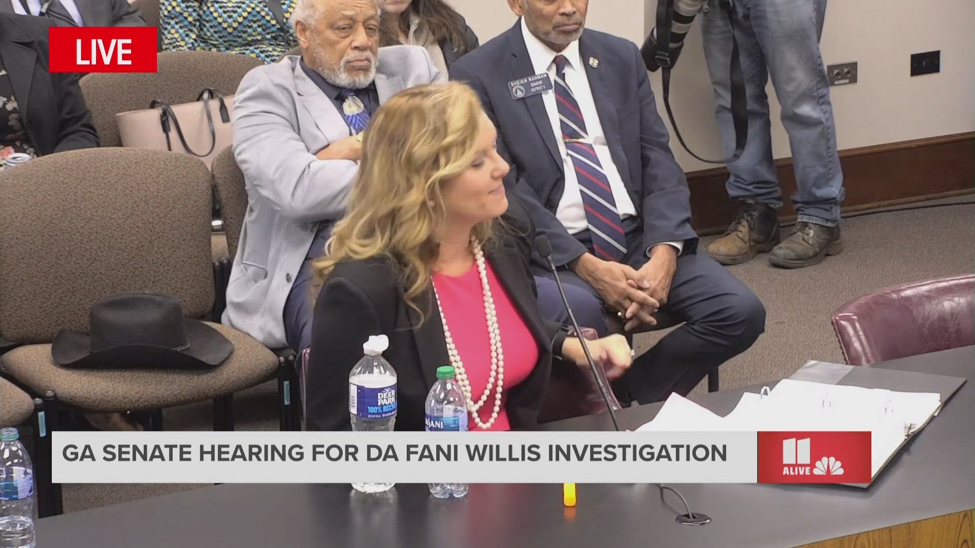 Ashleigh Merchant discusses the cost of the trips that Willis and Wade took and how it connects to the case's financial benefit and potential conflict on interest.