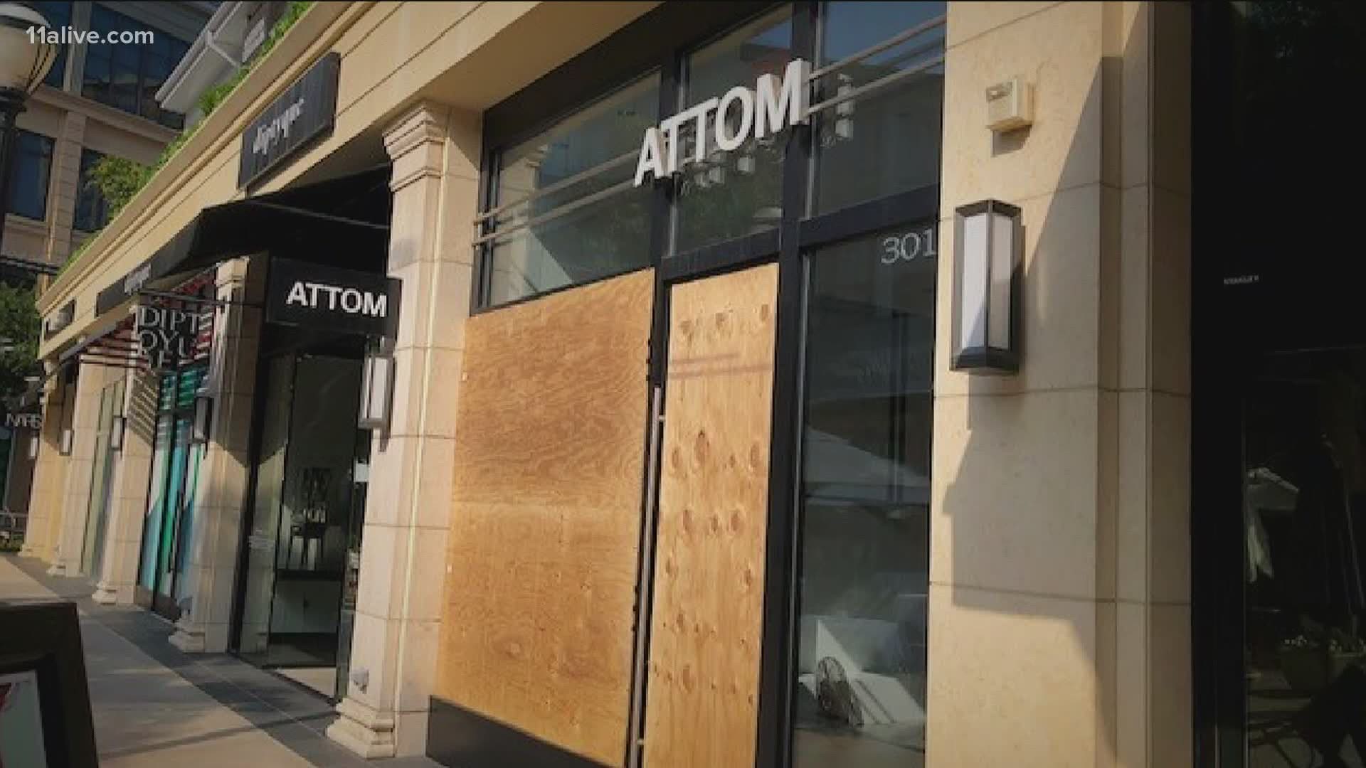 Zola Dias is in the U.S. on an investor's visa, but his investment - Attom clothing store in Atlanta - was devastated last Friday.