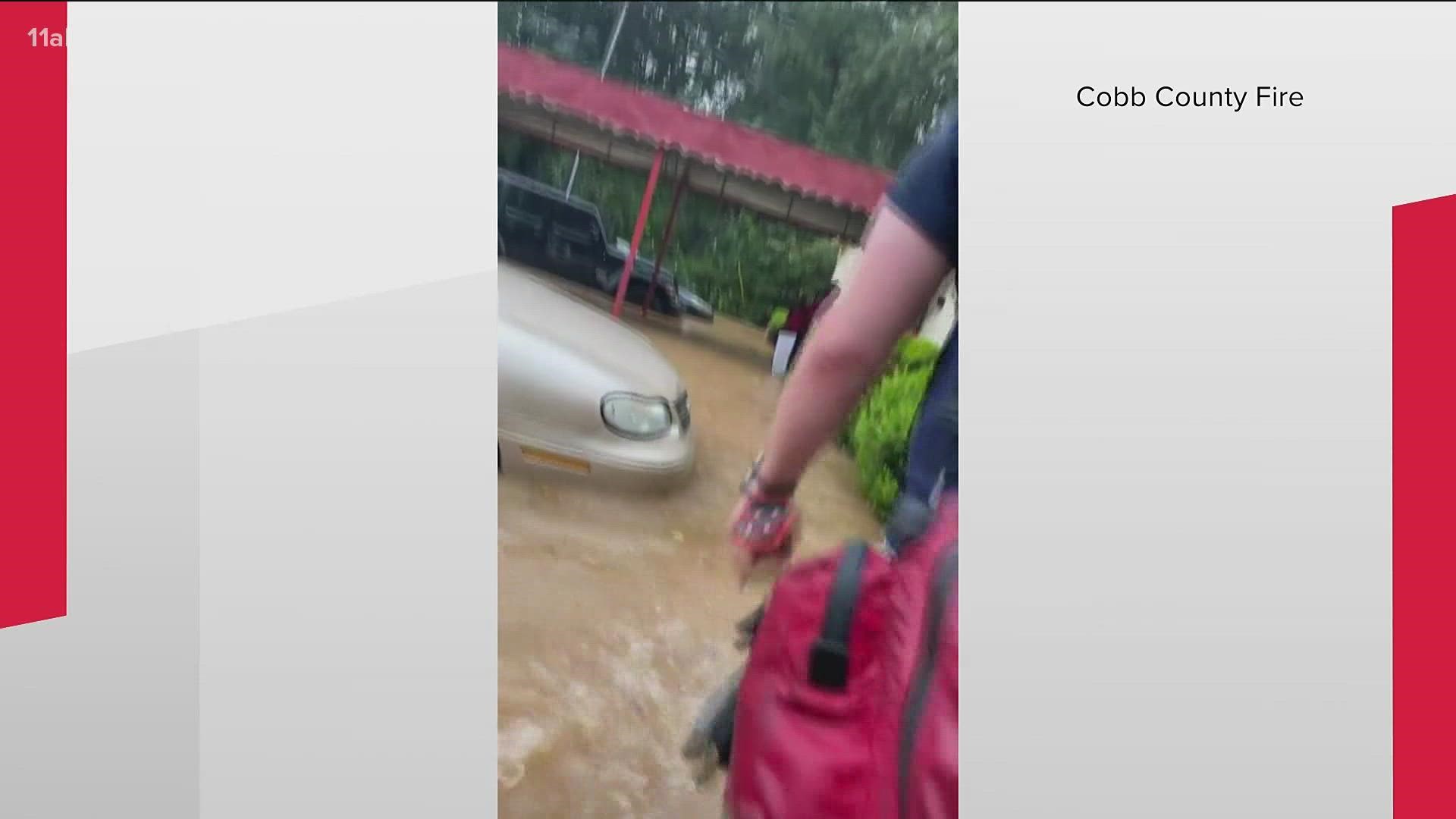 A flooded daycare leading to a rescue operation. Firefighters are working to safely evacuate 27 children and 4 adults.