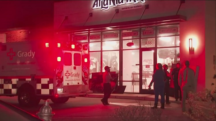 Woman shot at album release party at tattoo parlor near Grant Park, police say