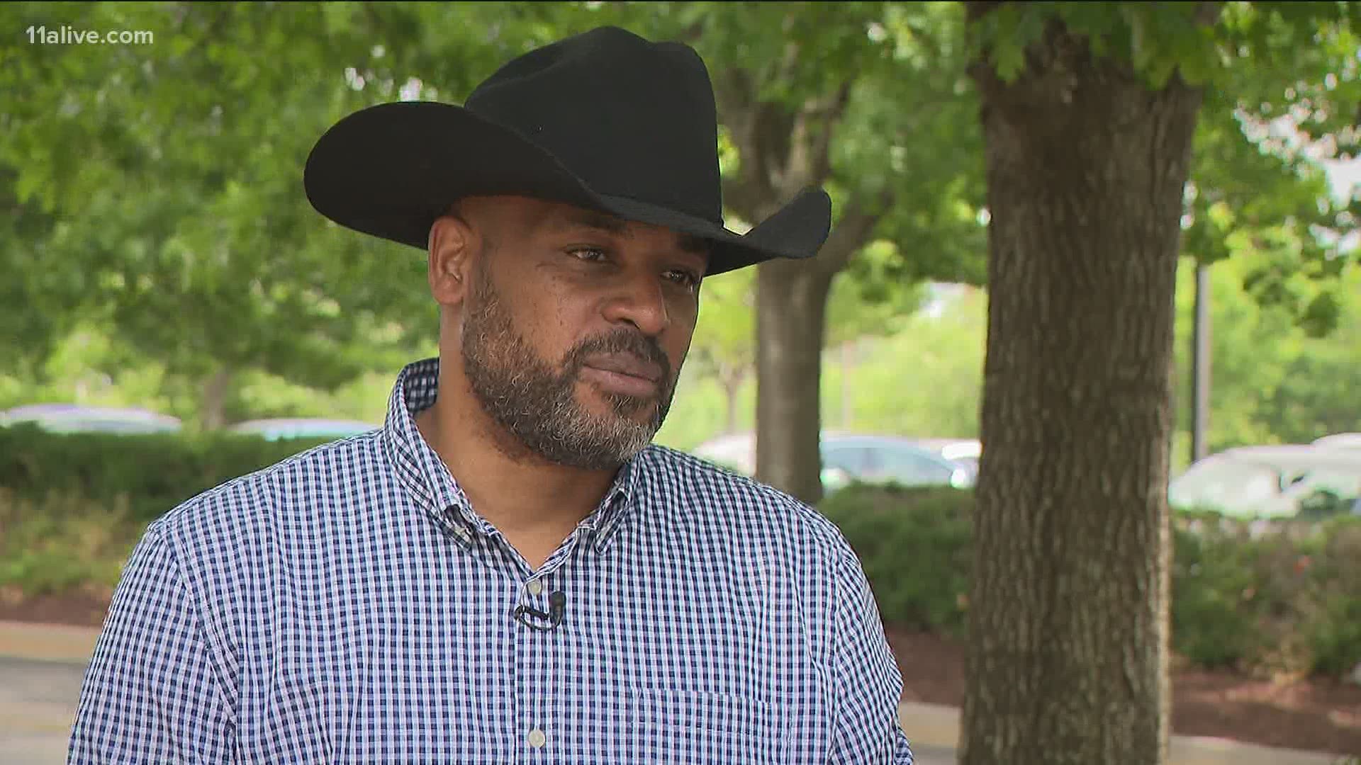 The organizers say they considered him a threat. The rally was hosted by Republican Congresswoman Marjorie Taylor Greene in Dalton.