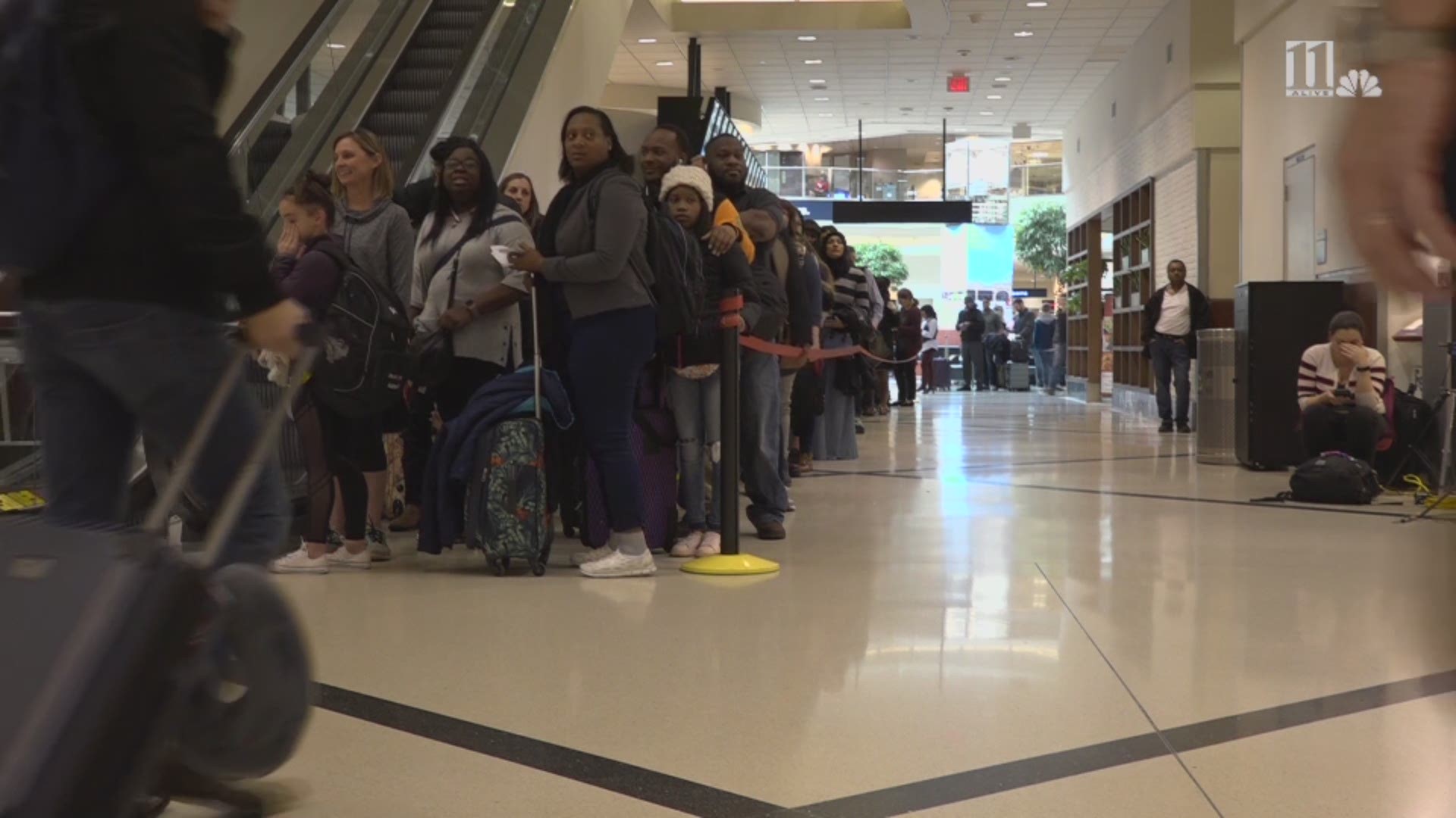 Travelers were greeted by exceedingly long lines at Atlanta's Hartsfield-Jackson International Airport on Monday morning.