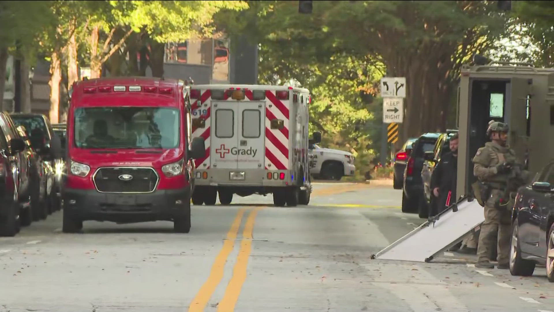 A person has been taken into custody after shots were fired around the busy Four Seasons Hotel in Midtown Atlanta on Tuesday afternoon. 