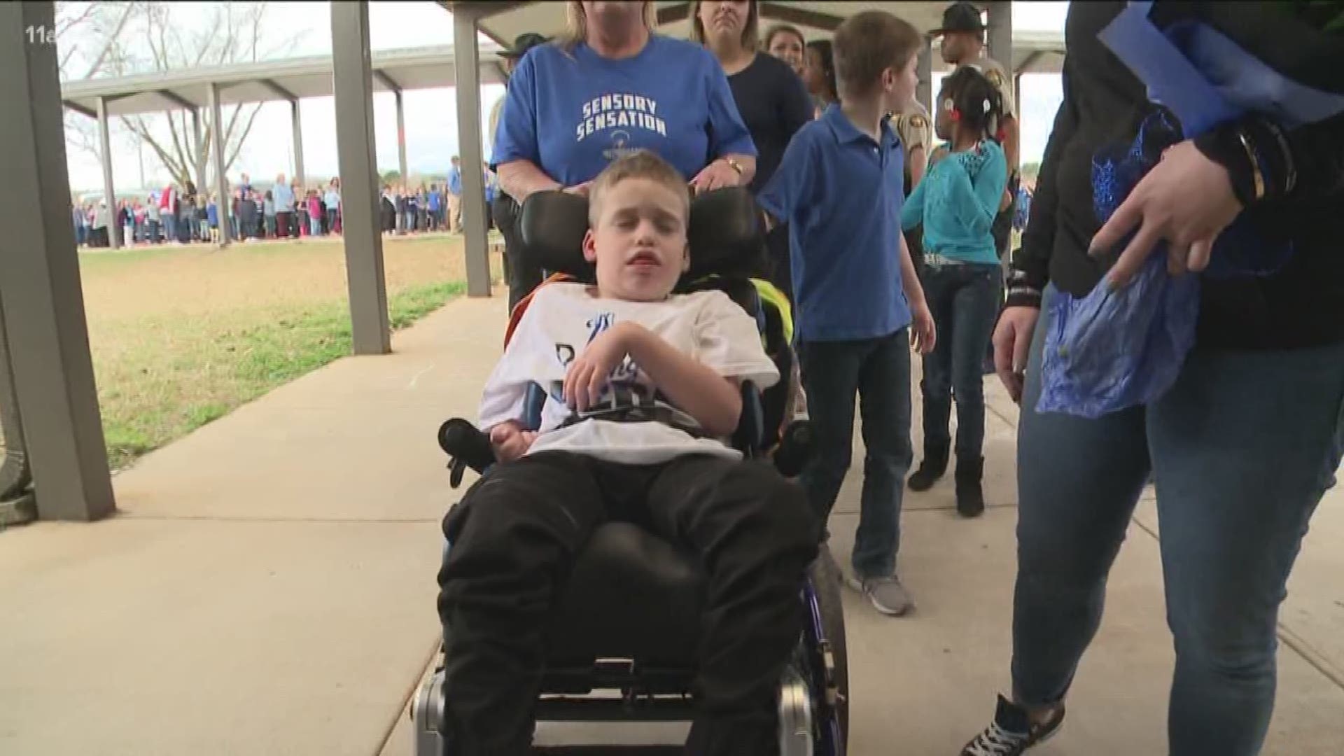 Officer Chase Maddox's son was greeted by his school and an escort of officers.