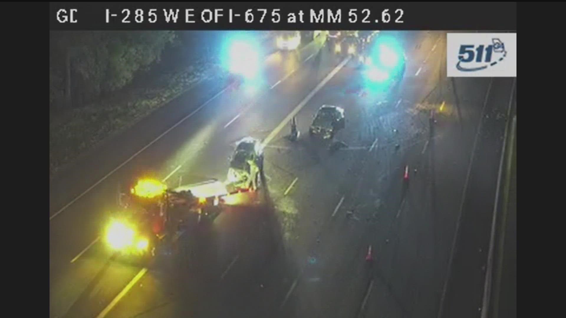 All lanes are closed on I-285 E. The crash is located past I-675, just before Bouldercrest Road.