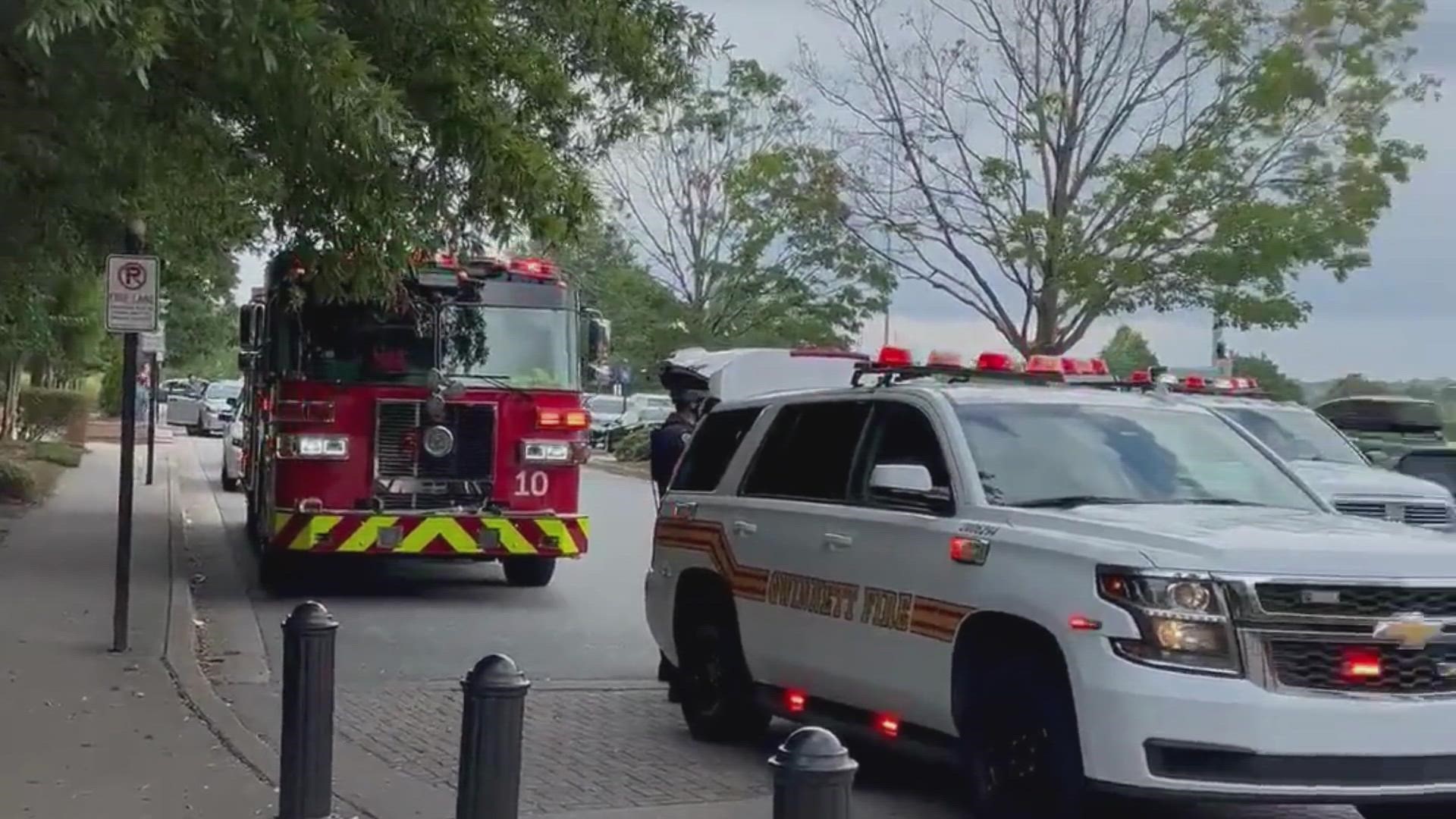 One person has been stabbed and a suspect was shot at the Macy's in the Mall of Georgia, Gwinnett County Police say.