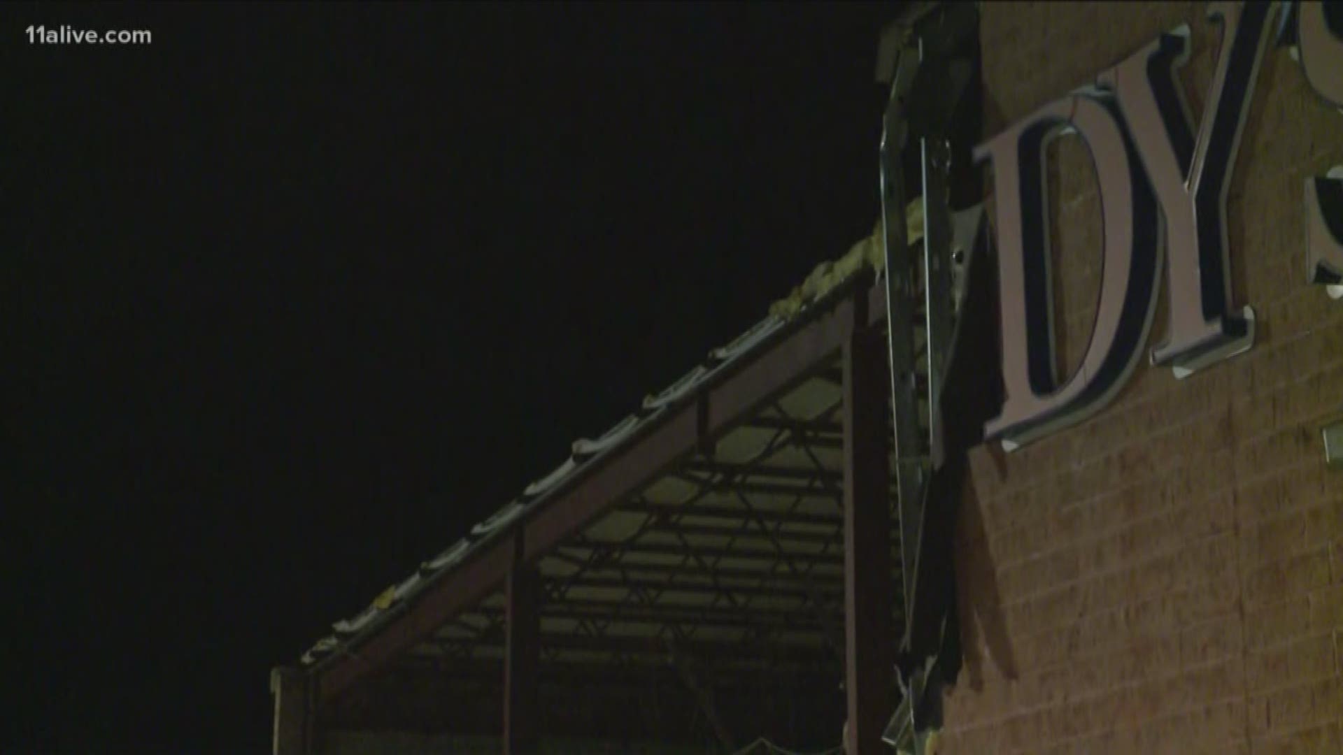 It's believed winds brought down the front of a Goody's store causing significant damage.