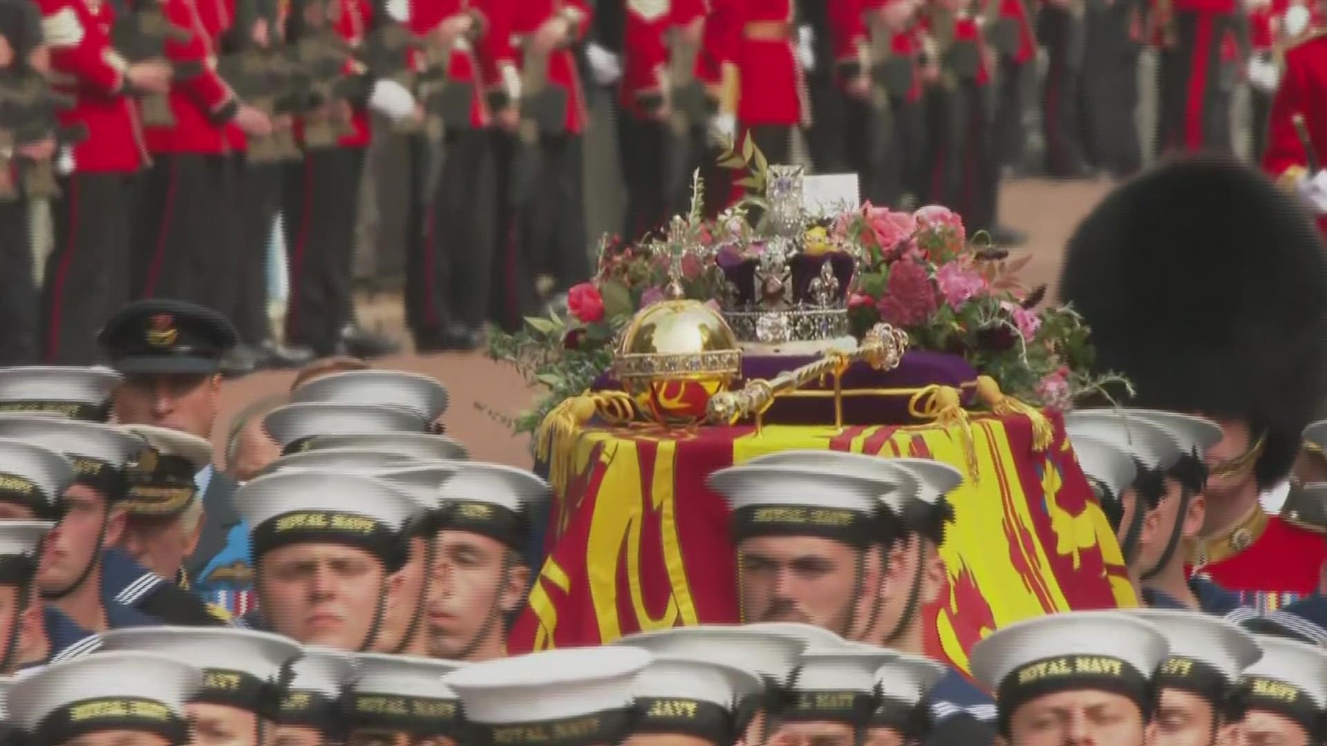 The note placed in the wreath on the queen's coffin was written by King Charles: "In loving and devoted memory. Charles R." (CNN Newsource)