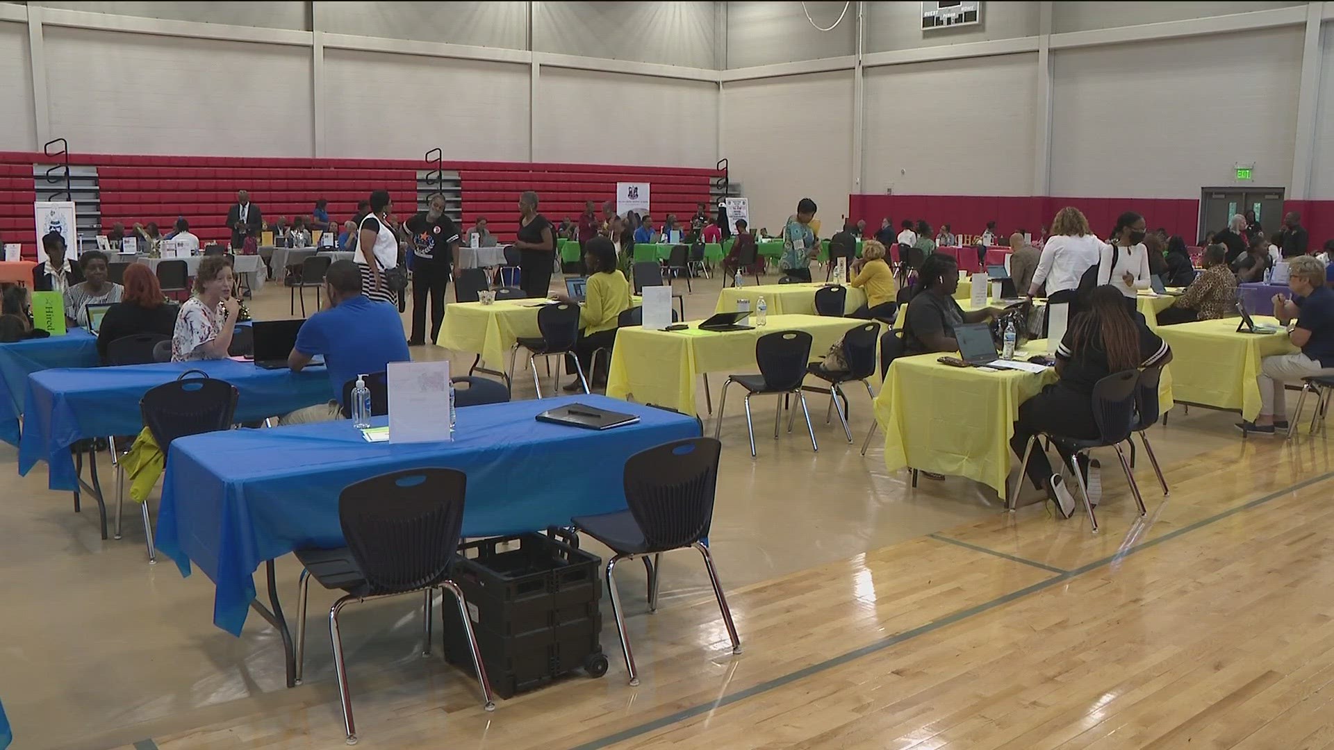 Amid a nationwide teacher shortage, hundreds of job applicants flood a metro Atlanta school district's job fair.