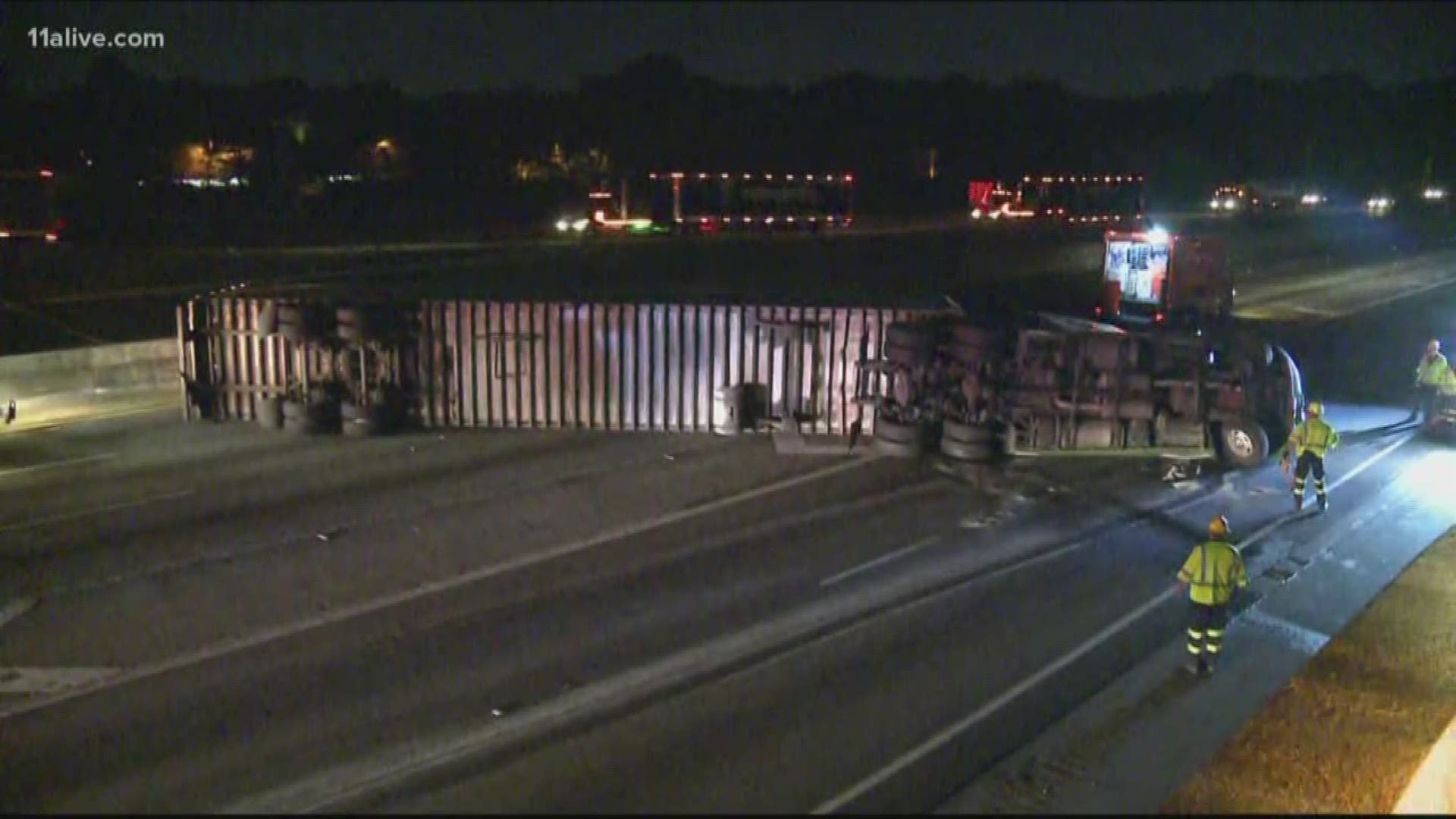 Lanes reopen on I-285 WB after tractor trailer overturns | 11alive.com