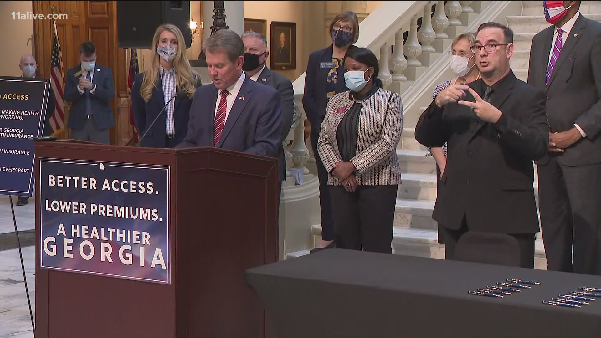 Georgia Gov. Brian Kemp announced federal approval of the state's program to provide a waiver for those seeking health insurance.