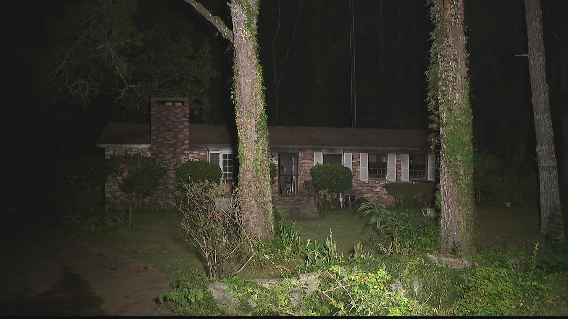 Two brothers lived inside the home. One was able to escape and call 911.