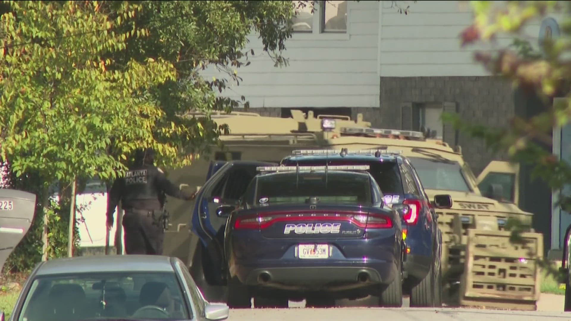 Police said a fight between roommates led to a deadly shooting. When police arrived, officials said he barricaded himself inside, launching a SWAT standoff.