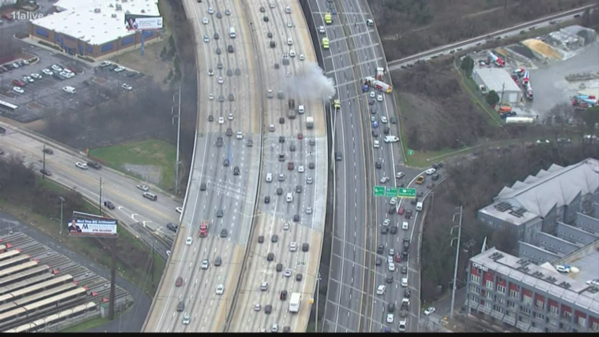 Smoke billowed out from below Interstate 85 in Atlanta yesterday, in a scene eerily reminiscent of the fire that collapsed a bridge along the highway nearly three ye