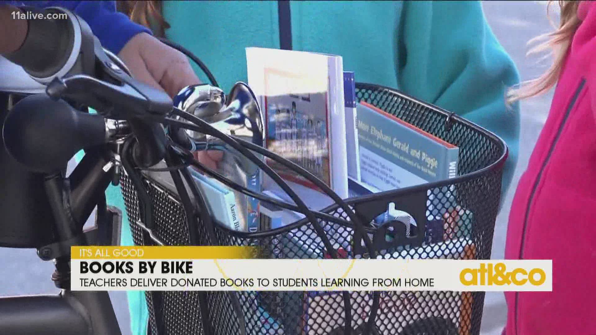 Thanks to a bicycle donation, teachers are riding around town with a basket of books to deliver to students learning from home.