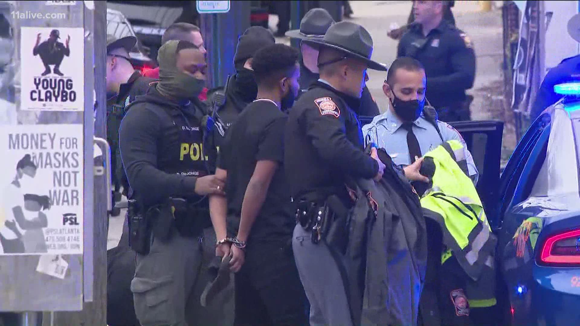 Atlanta Police detained members of a group of protesters who allegedly walked onto the Downtown Connector on Thursday afternoon.