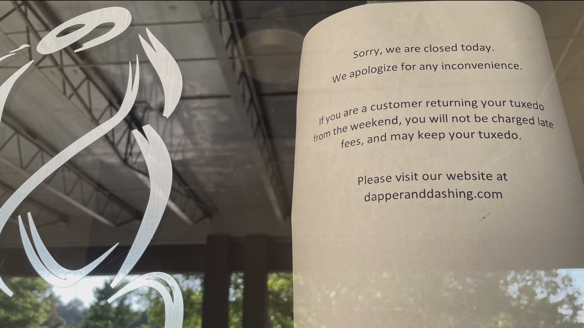 Several Dapper & Dashing branded locations in metro Atlanta posted notices on their doors indicating the closure, telling customers to keep their rentals