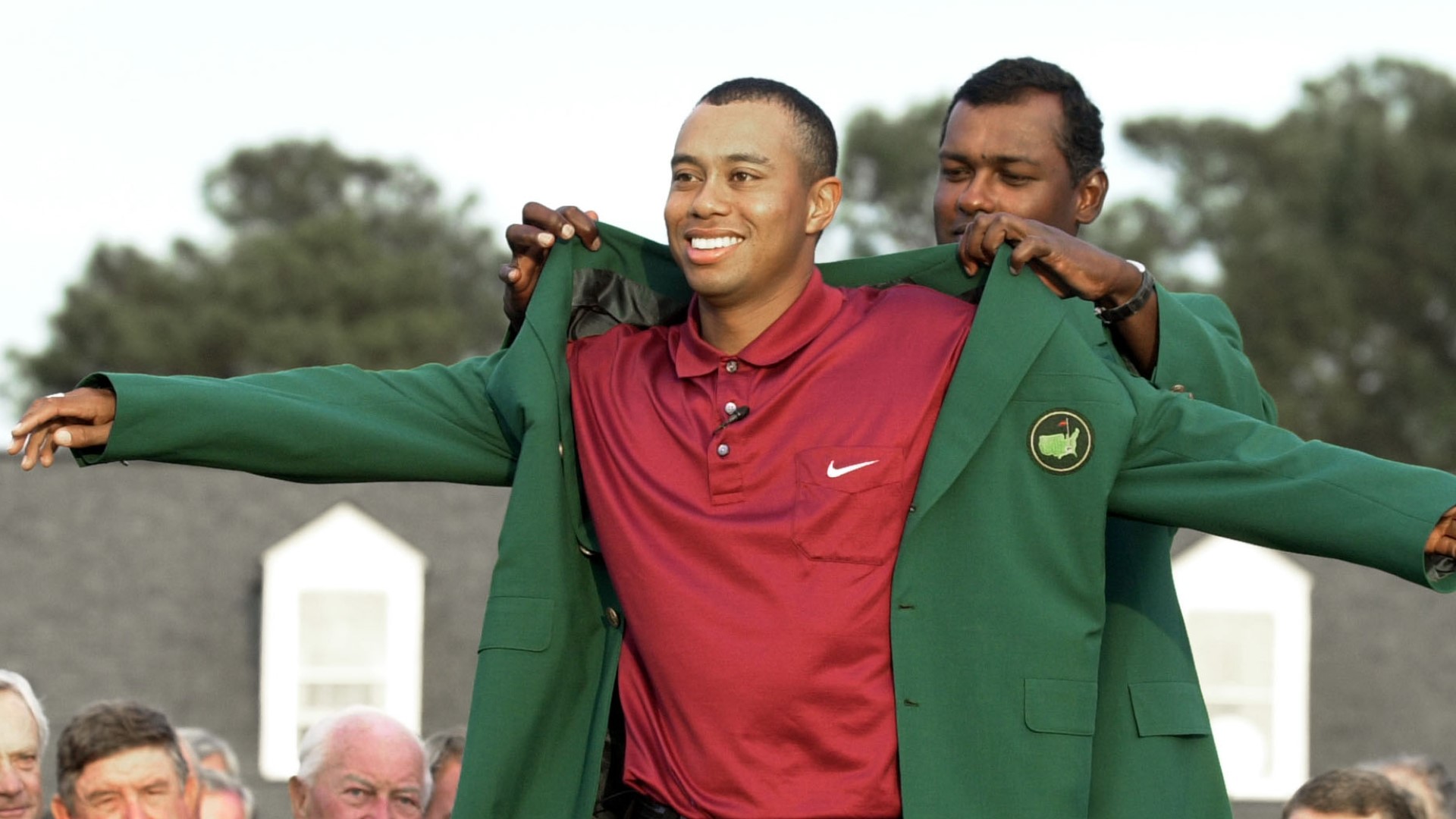 Tiger Woods wears the Masters green jacket