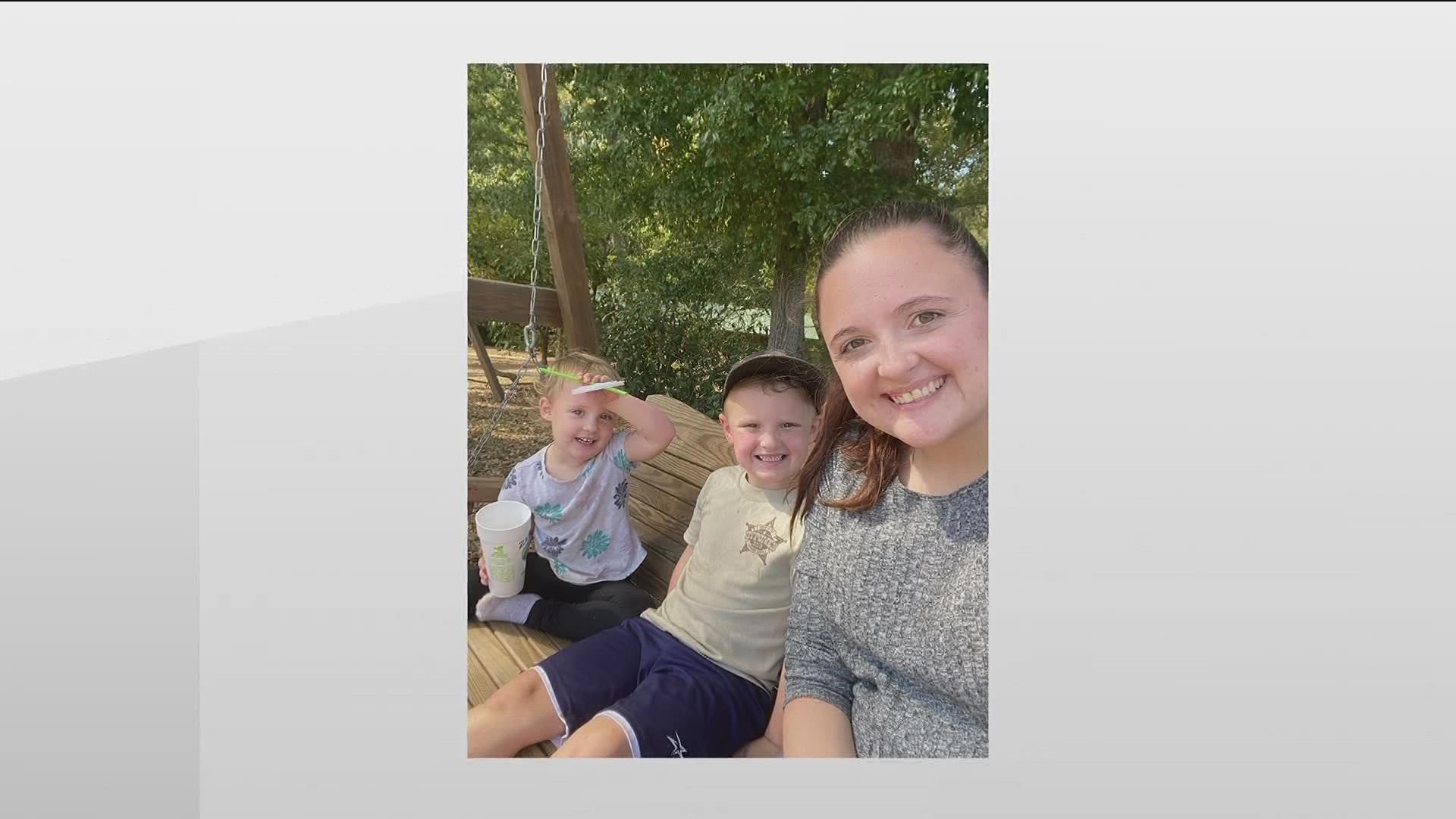 Authorities are searching for the driver of BMW SUV who fired multiple rounds into Georgia family's car. The mom is fighting for her life.