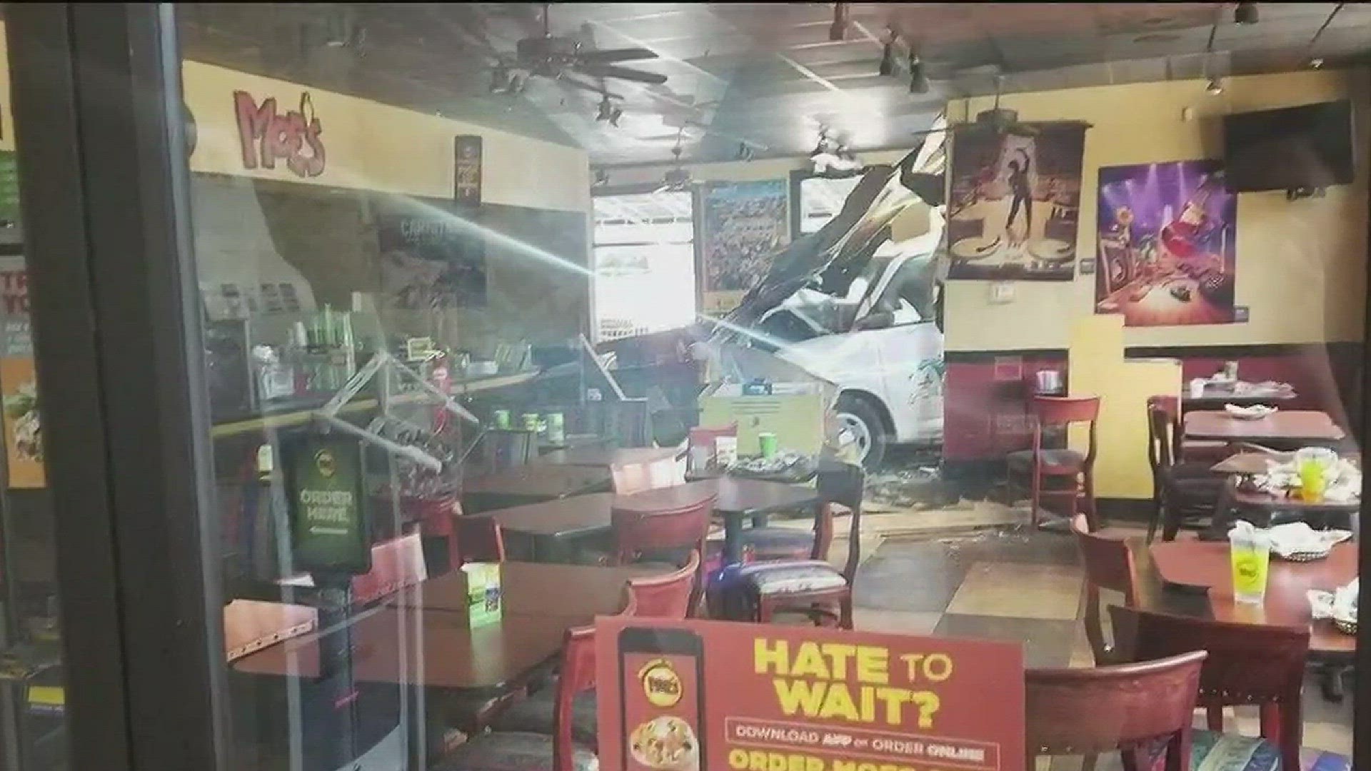 Car plows into Lumpkin Co. Moe's restaurant