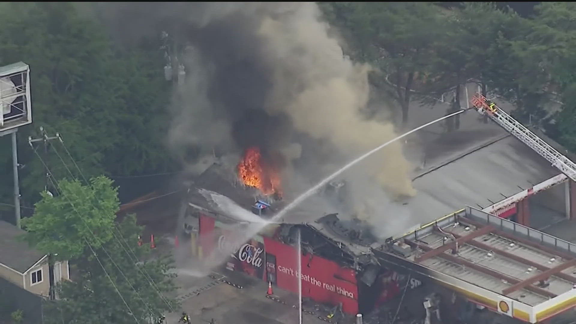11Alive SkyTracker flew over a Shell gas station along Northside Drive, where heavy smoke was seen as firefighters worked to extinguish the flames.