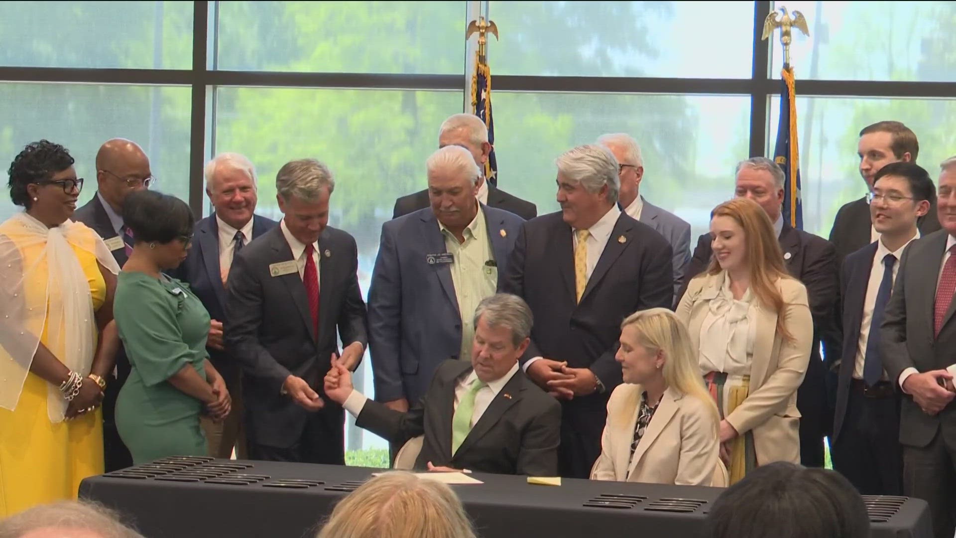 He signed a total of six bills into law in the Augusta Municipal Building on Thursday.