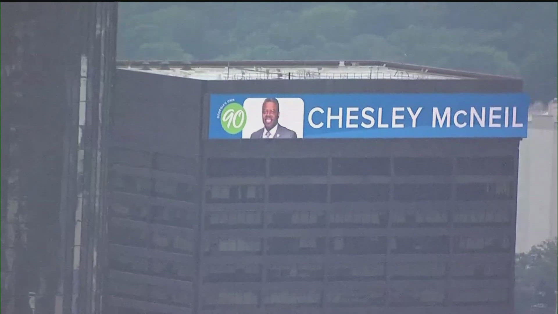 Chesley McNeil featured on Georgia's Own sign on 100 Peachtree building ...