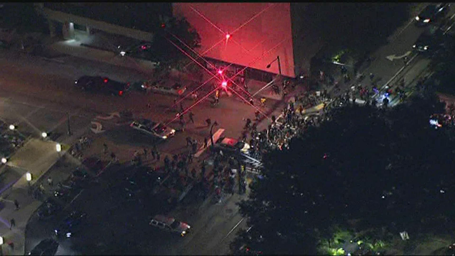 Video from 11Alive Skytracker11 shows protesters using fireworks as projectiles.