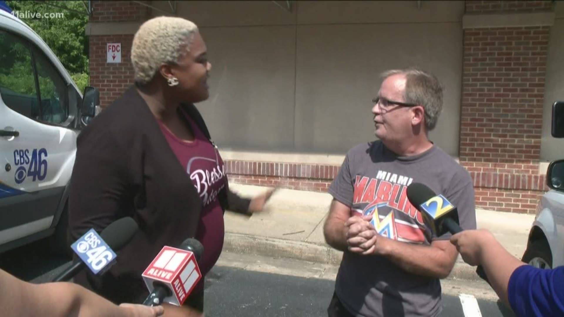Georgia state Rep. Erica Thomas said over the weekend that a white man told her to "go back where you came from" at a supermarket, before he showed up for his own press conference to dispute that - though he admitted he did call her an expletive for using the "10 items or less" line with too many items. Thomas is pregnant and was with her child at the time.