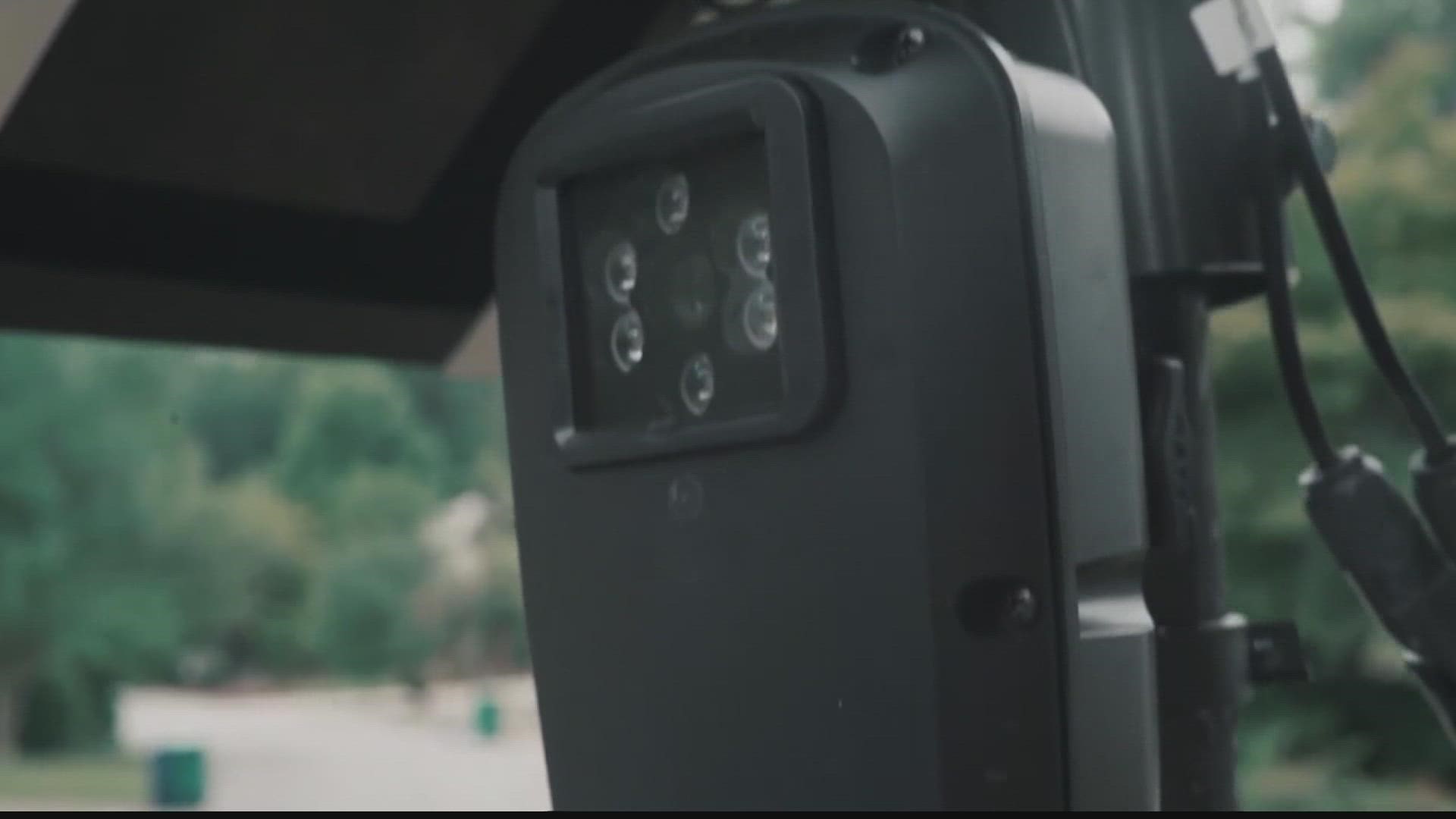The cameras can scan license plates and other characters of any vehicle, but not people or their faces.