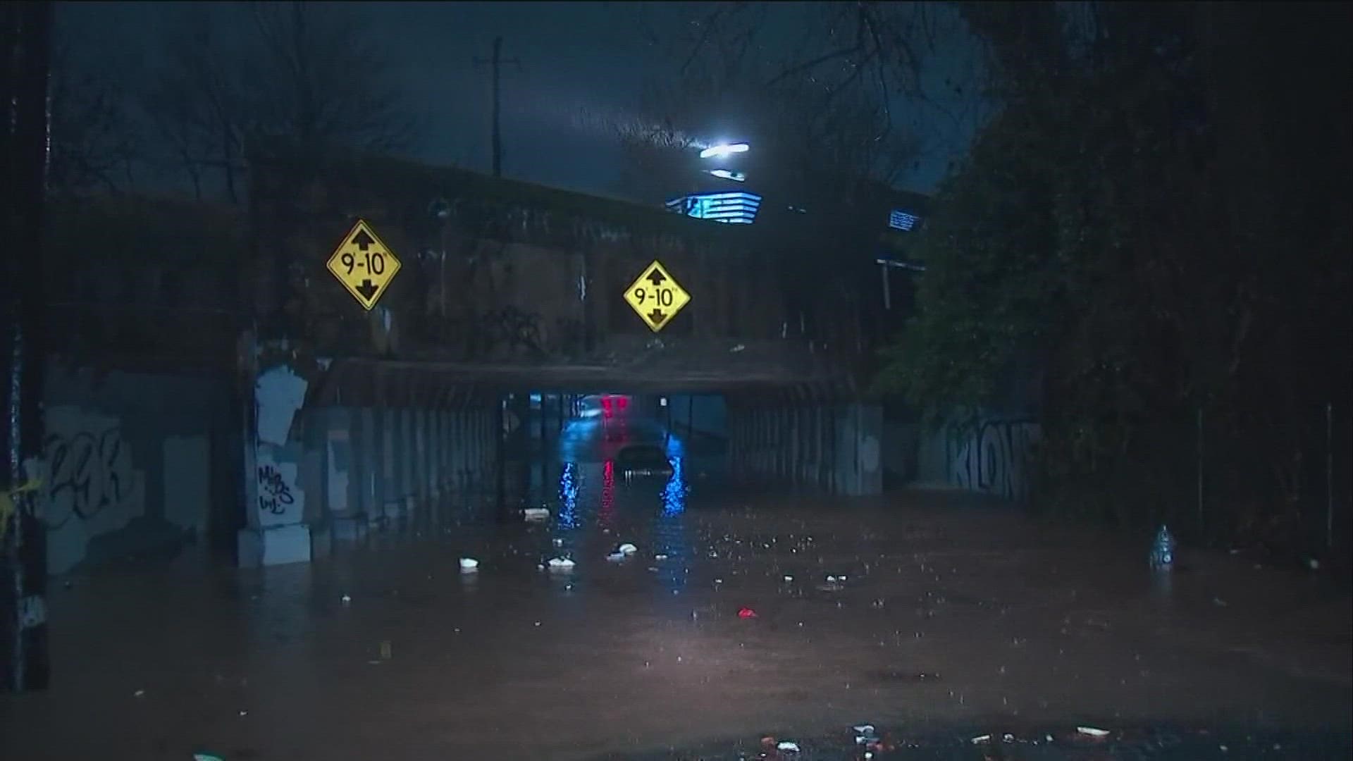 Flooded roadways have been spotted across metro Atlanta as a band of storms moves through.