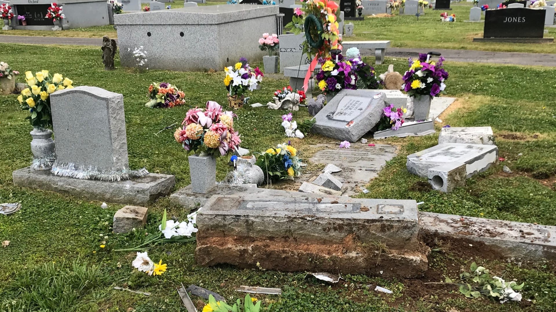 Graves wrecked at Dalton's West Hill Cemetery by alleged drunk driver