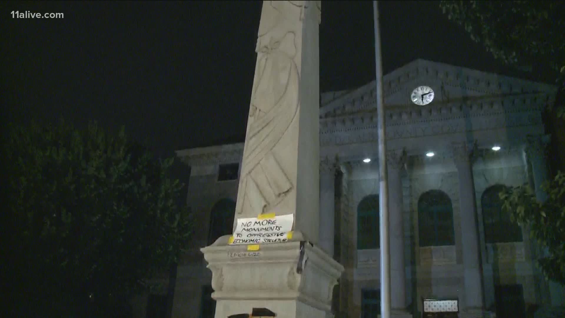 The court order says the move is being done to abate a public nuisance and protect the statue from vandalism.